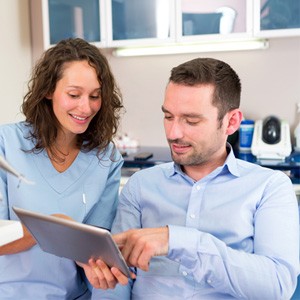 Patient consulting with a dentist