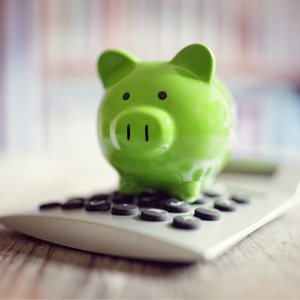 Piggy bank on a calculator