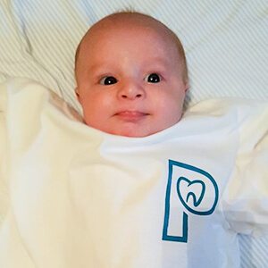 baby with parker dental shirt