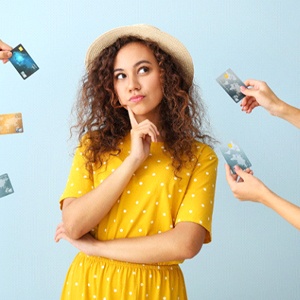 Woman surrounded by credit cards