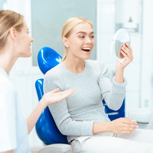 A woman seeing a cosmetic dentist
