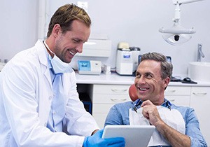 Man smiling at the dentist in West Mobile