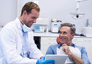 Man smiling at the dentist in West Mobile