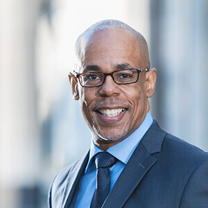 man in suit smiling