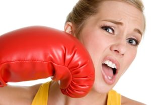 Woman boxer punched in face