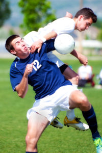 soccer player hit with ball