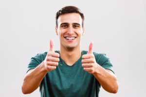 Boy smiling with braces