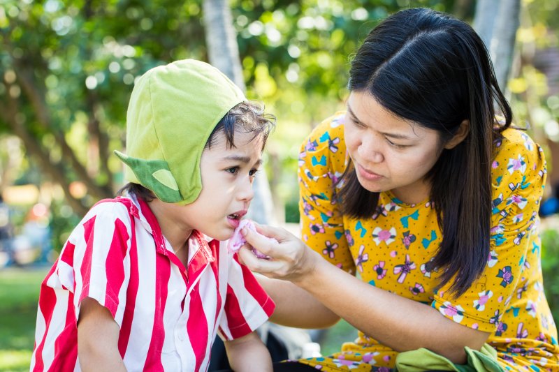 a child experiencing a dental emergency
