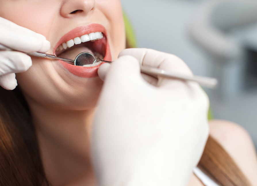 Close up of woman's mouth at dental exam